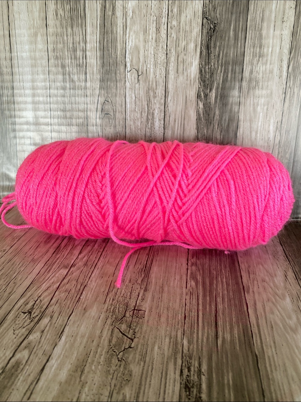 1 BALL OF PINK YARN